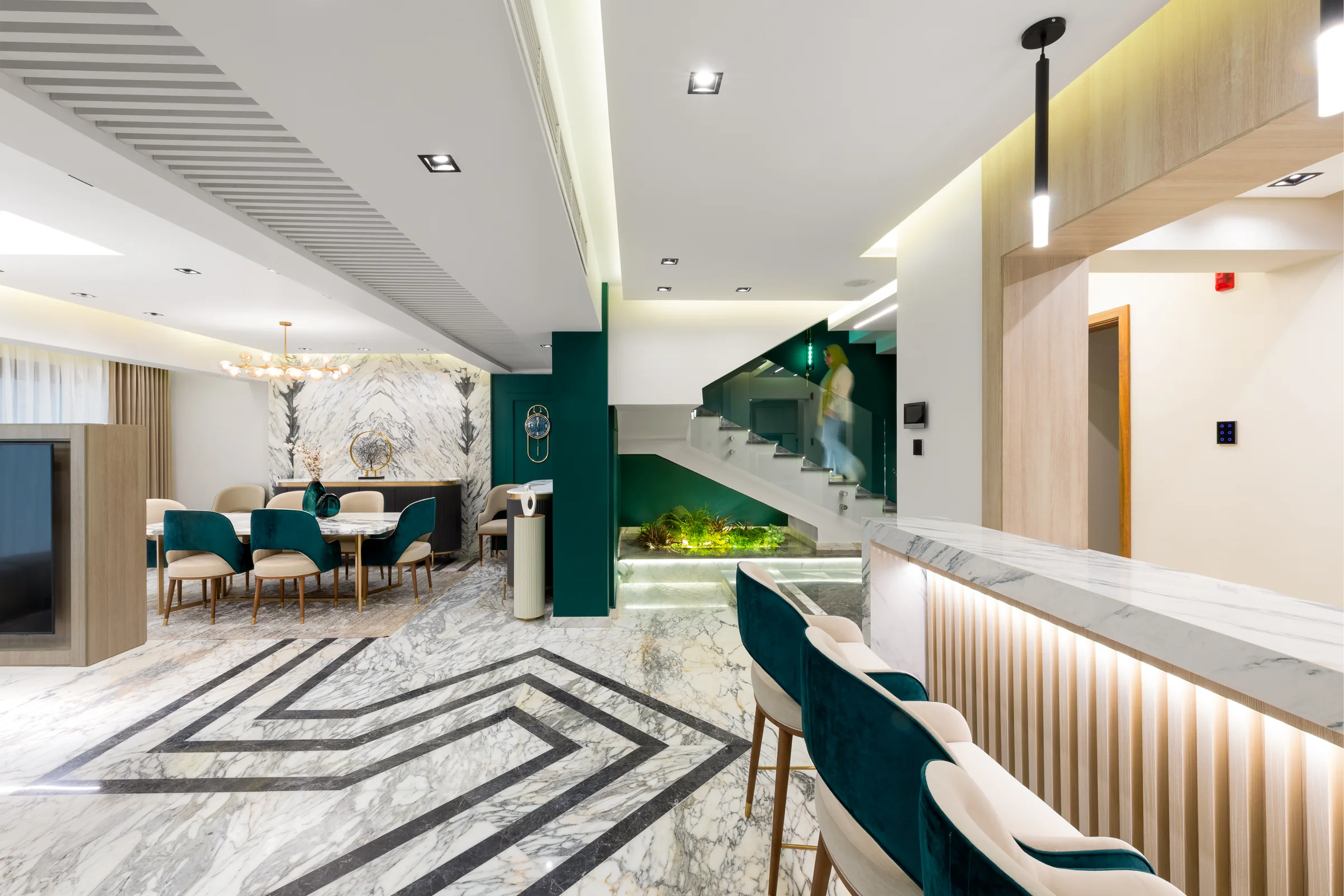 Bar and dining together, marble inlay running through.