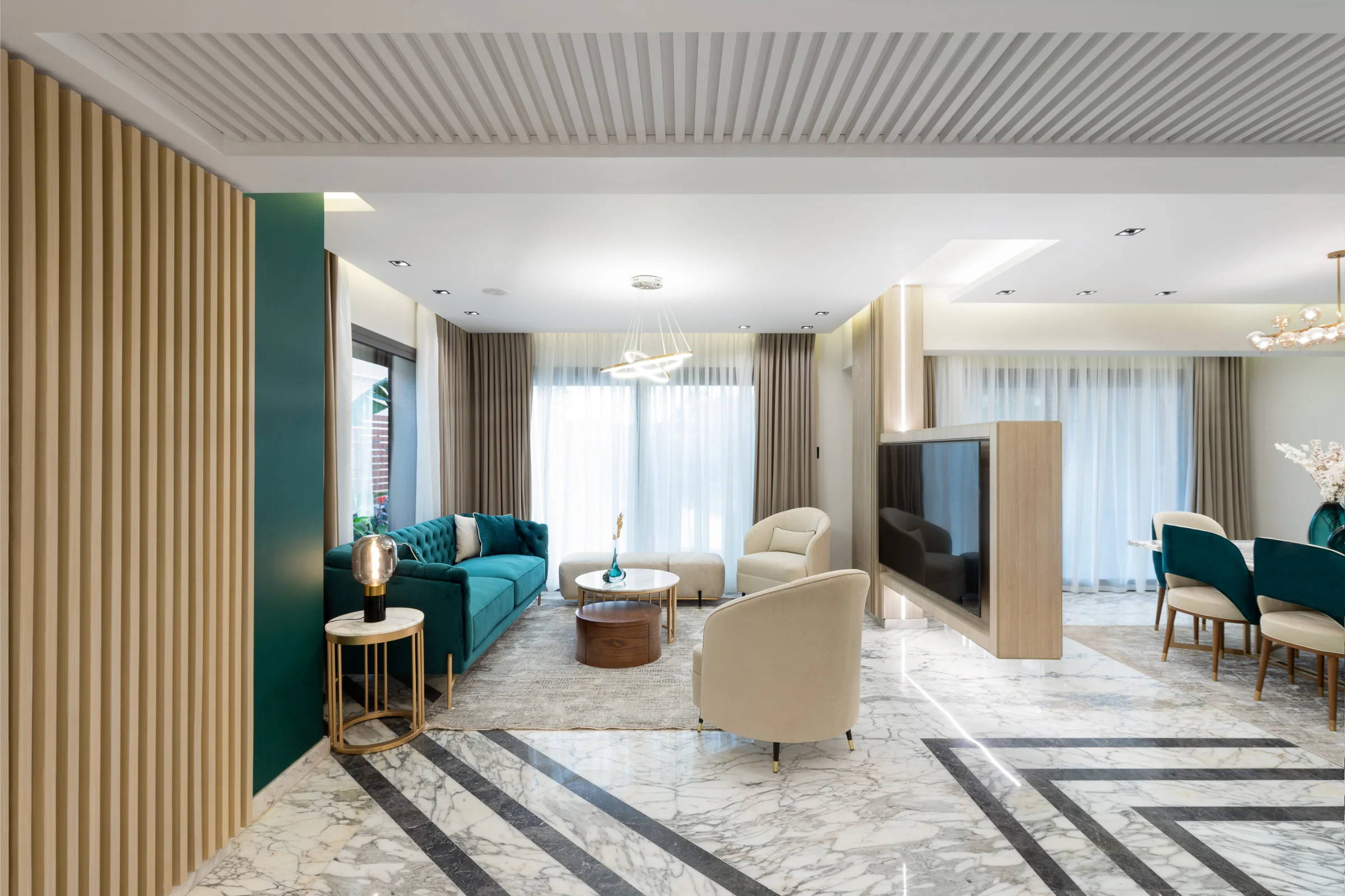 Living room along its length, slatted wall to the left.
