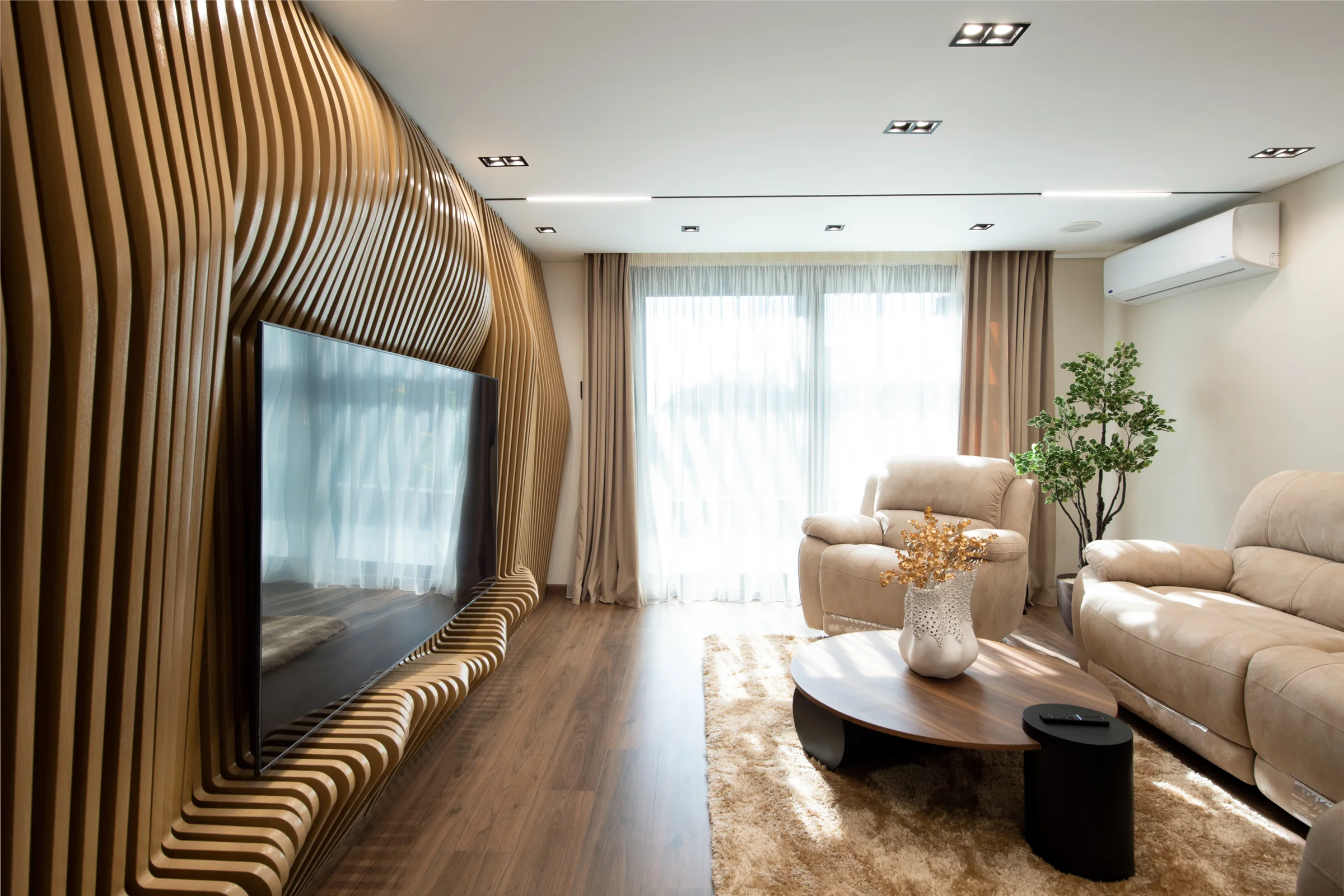 Curved timber slats wrapping the television wall.