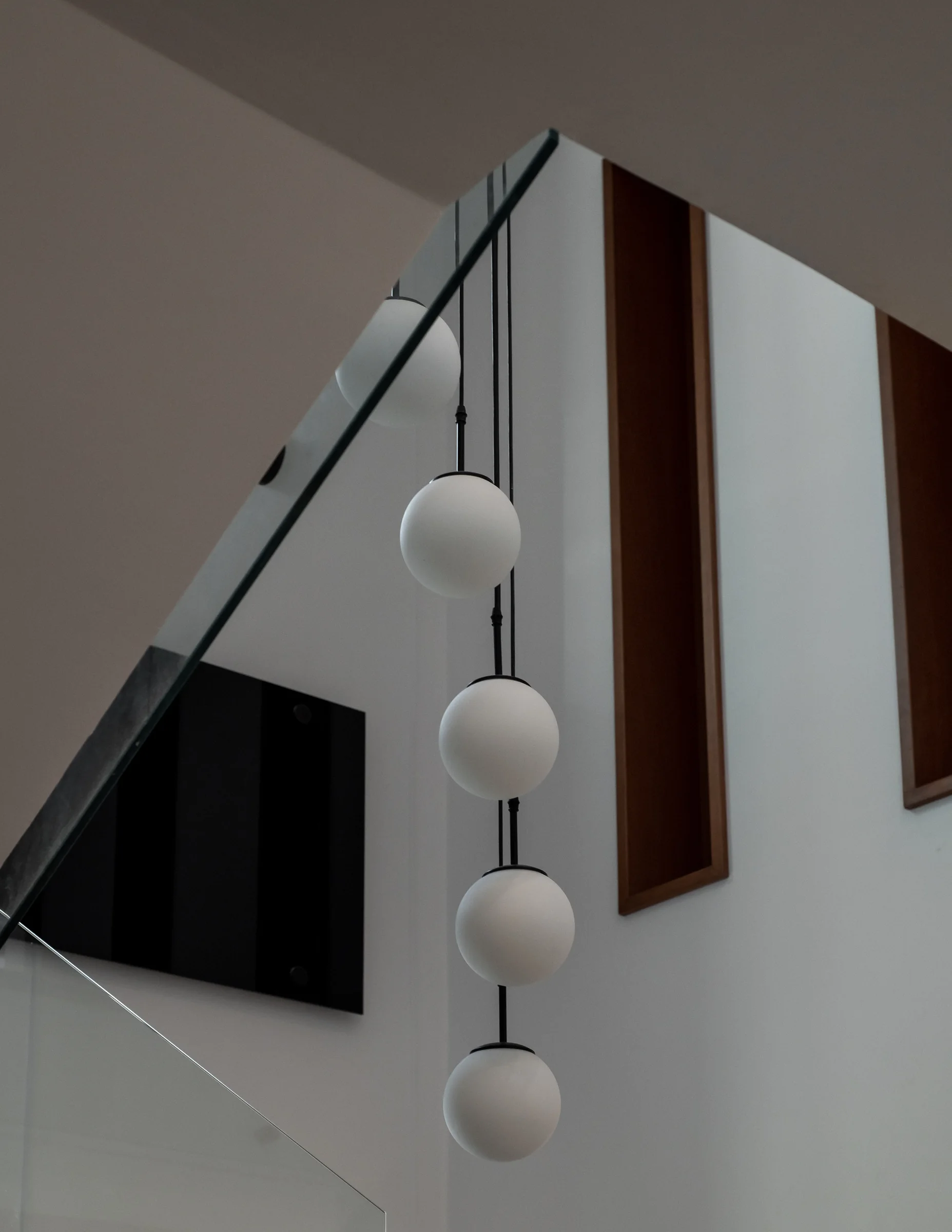 Stair, screen and pendant reduced to three planes.