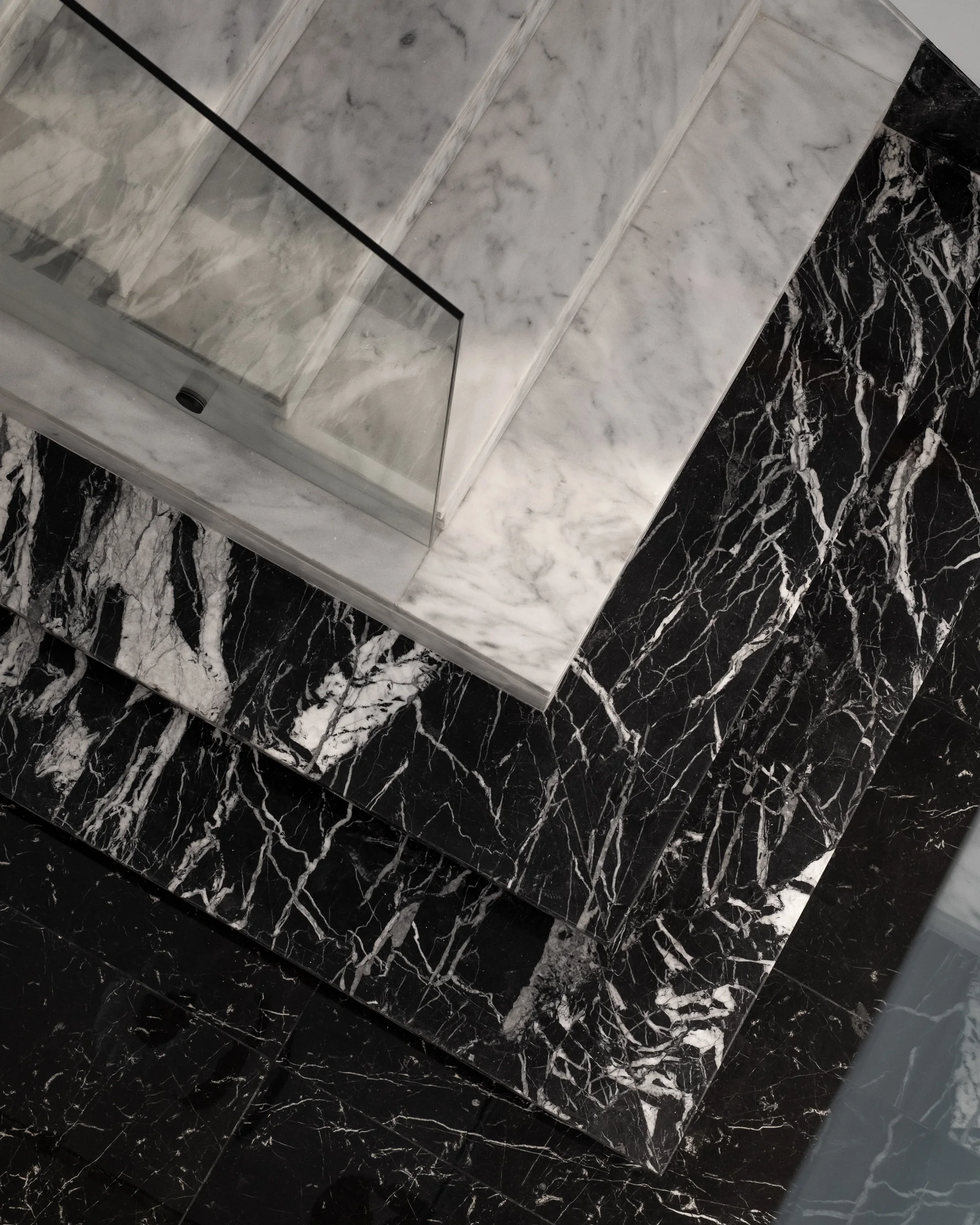 Black marble stair nosing, close.