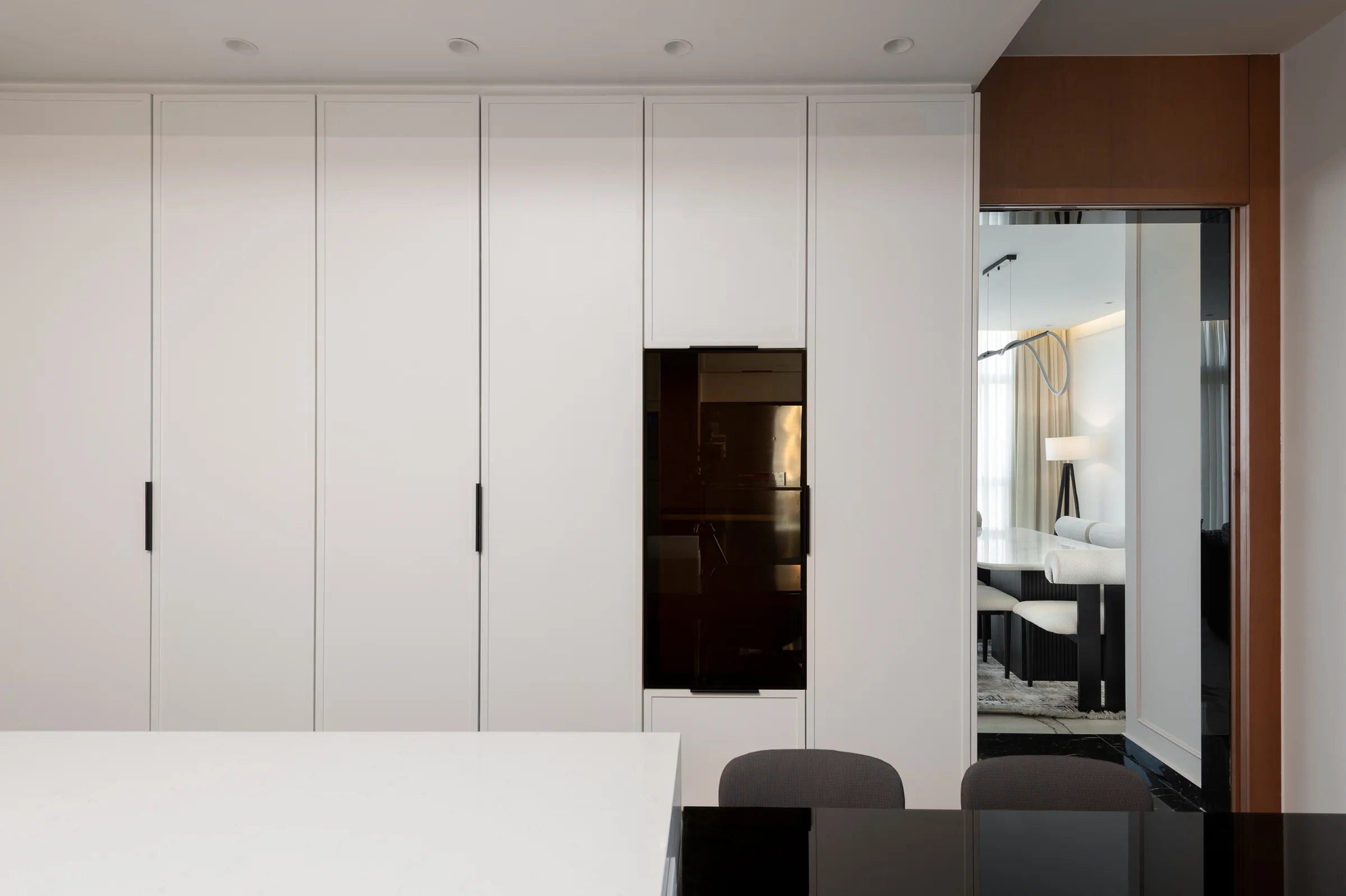 White joinery and the passage through to the bedrooms.