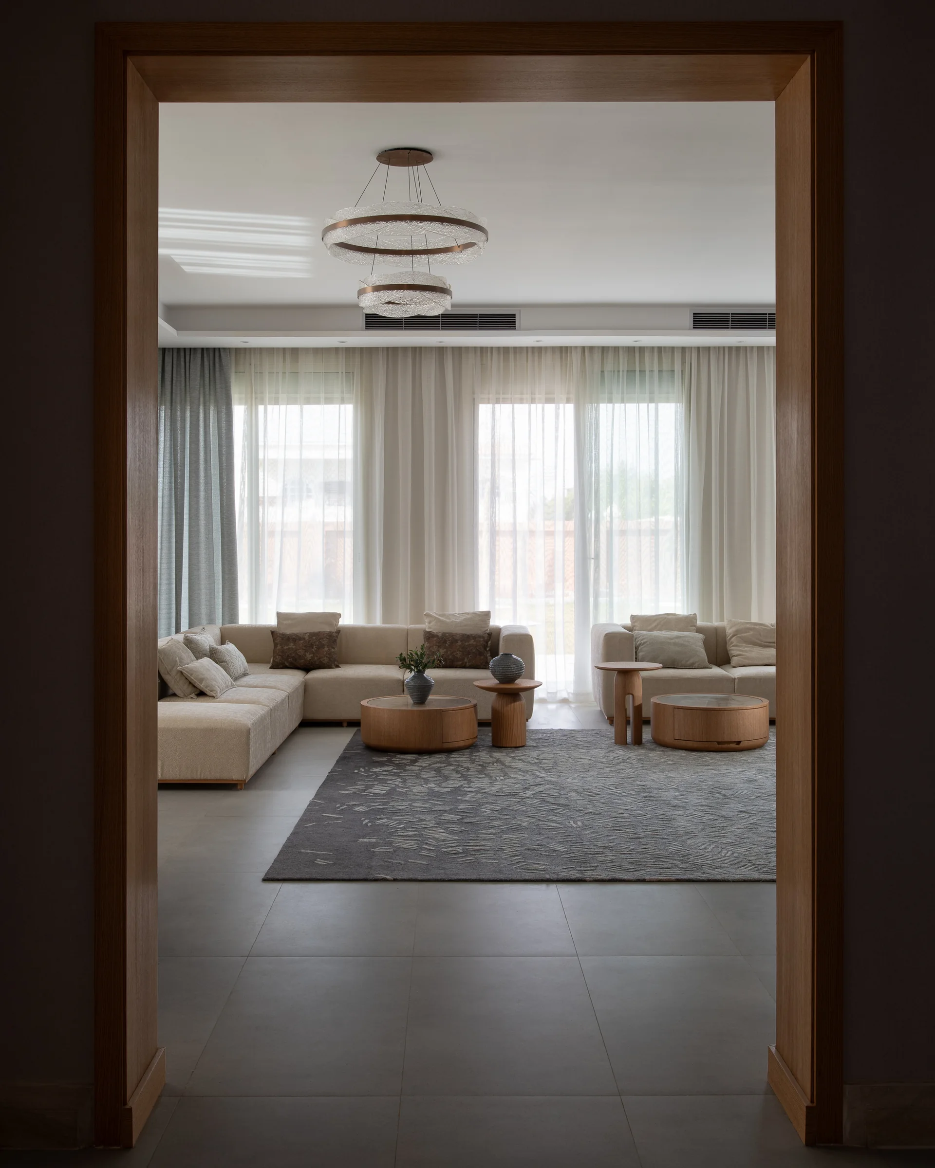 The main reception framed by a full-height oak door surround.