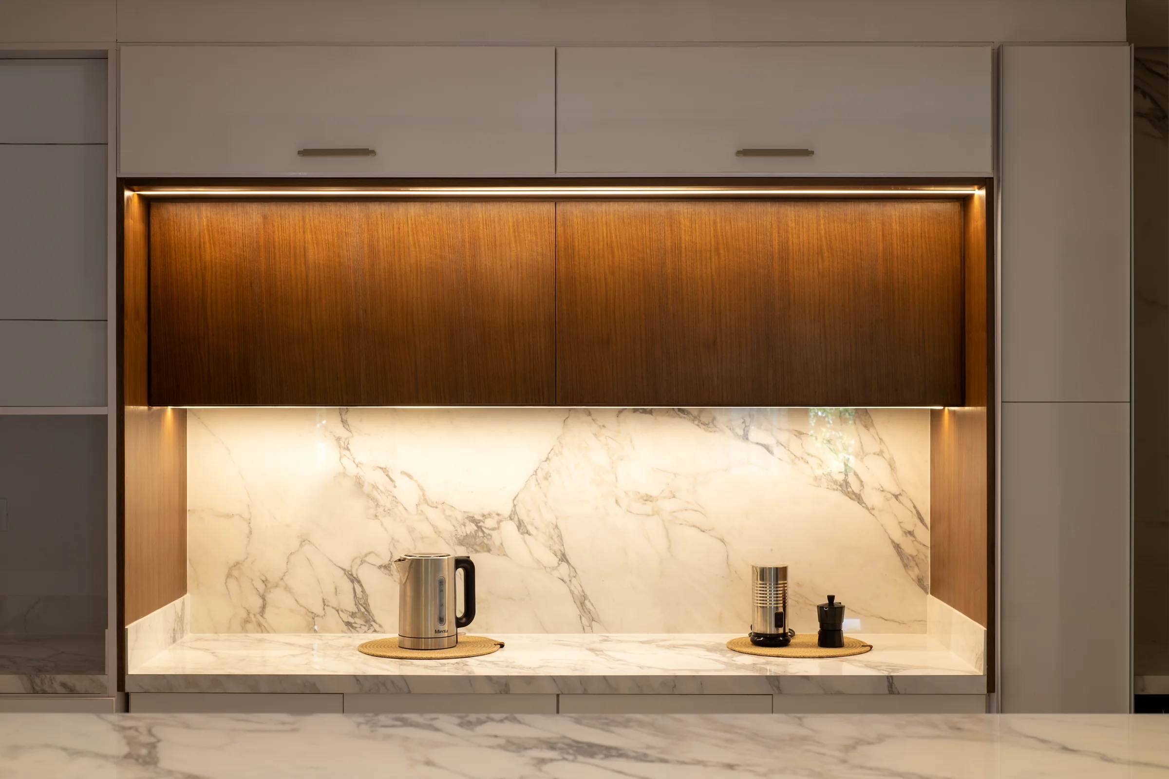 Kitchen counter under the walnut canopy.