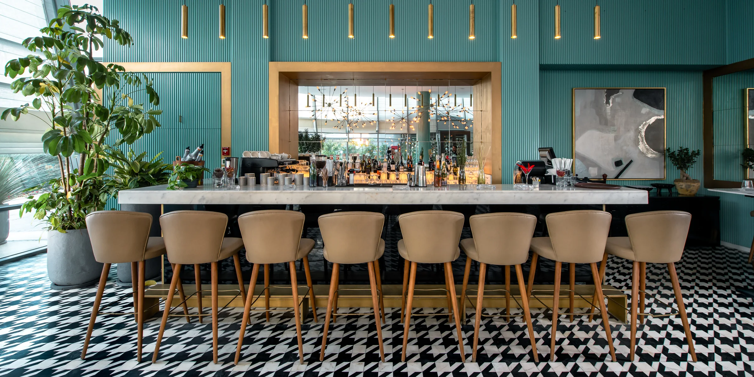 The bar end to end, checkerboard floor running out of frame.