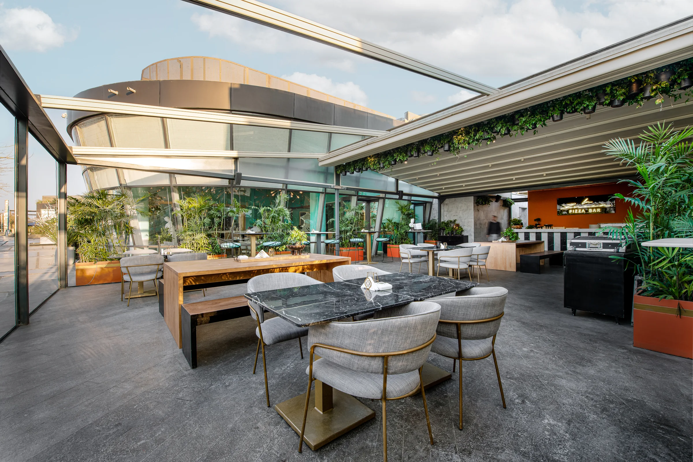 The terrace by day, the Walk beyond the glazing.